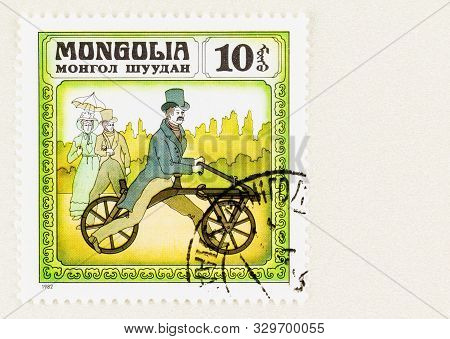 Seattle Washington - October 4, 2019:  Male Rider On Draisine Bicycle, Invented In 1816, On Mongolia