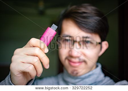 Portrait of Asian man setting his hair