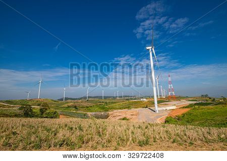 Khao Kho Wind Turbines On The Hill In Phetchabun Province, Thailand On Beautiful Blue Sky Day, Lands