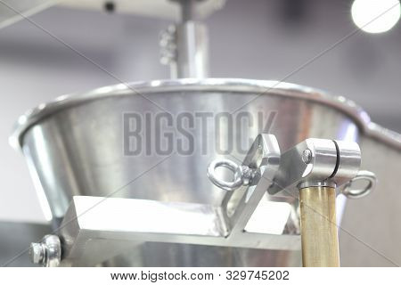 Stainless Hopper Is A Part Of Machine For Storage And Suppy Raw Material  Before Processing