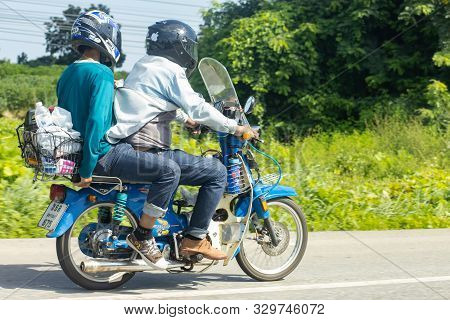 Bangkok, Thailand, Oct 14, 2019 - Man And His Friend Driving An Old Classic Vintage Motorbike With H