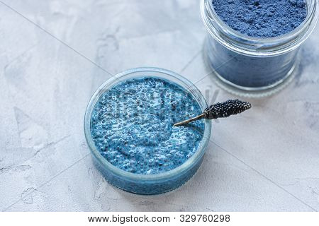 Blue Spirulina Or Butterfly Pea Flower Blue Matcha Powder Chia Seed Pudding Bowl. Close Up, Top View
