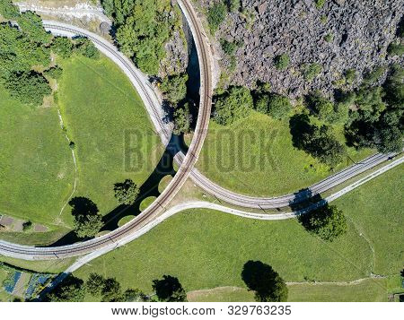 Patten Of Drone Image Over The Spiral Viaduct Of Swiss Mountain Railway In Brusio, Switzerland - Aer