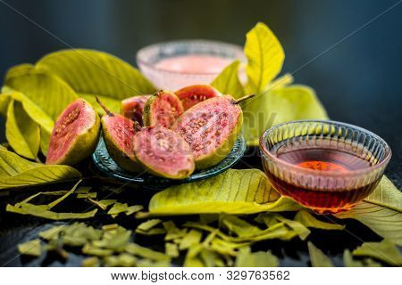 Skin Whitening Remedy/treatment On The Black Shiny Surface Consisting Of Guava Pulp And Honey. Also