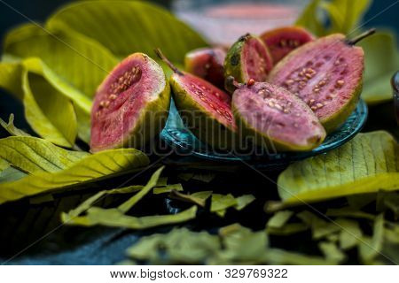Skin Whitening Remedy/treatment On The Black Shiny Surface Consisting Of Guava Pulp And Honey. Also 