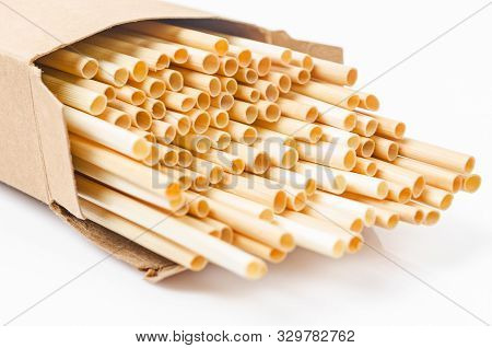 Wheat Straw For Drinking Water In Brown Paper. Zero Waste Concept.