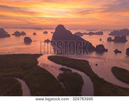 Aerial Top View Of Samet Nangshe, Mountain Valley Hills, And Tropical Green Forest Trees At Sunset W
