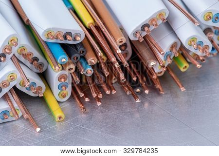 Electrical Copper Cable And Wire On Metal Workshop Table