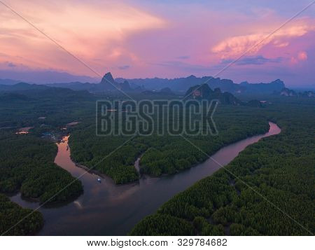 Aerial Top View Of Samet Nangshe, Mountain Valley Hills, And Tropical Green Forest Trees At Sunset W