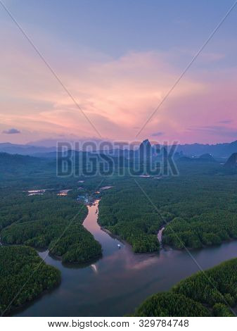 Aerial Top View Of Samet Nangshe, Mountain Valley Hills, And Tropical Green Forest Trees At Sunset W