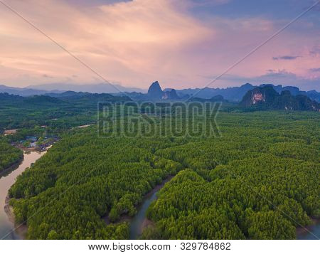 Aerial Top View Of Samet Nangshe, Mountain Valley Hills, And Tropical Green Forest Trees At Sunset W