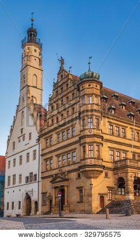 Two Rathaus buildings, Old Gothic and New Renaissance, at Marktplatz (market square) in Rothenburg ob der Tauber, Bavaria, Germany, Europe, one of the most popular travel destination on Romantic Road