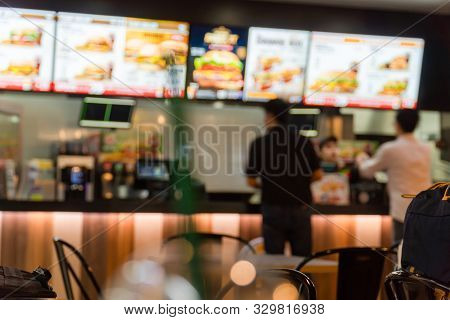 Blurred Image Of A Fast Food Restaurant, Also Known As A Quick Service Restaurant Within The Airport