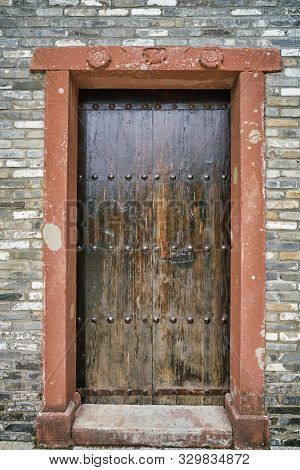 SHENZHEN, CHINA - CIRCA APRIL, 2019: view of a door seen at Gankeng Hakka Town in Shenzhen. Gankeng Hakka Town is a tourist attraction by OCT Group.