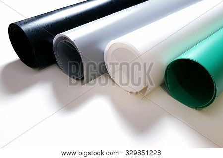 Four Rolls Of Pvc Matte Reflective Dual Side Photography Backdrop Background Paper. Black, Gray, Whi