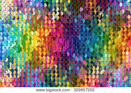 Sequins Background. Multicolored Sequins. Background With Shiny Sequins On Fabric.