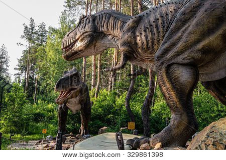 Belgorod, Russia - May 31, 2019: Full-size Tyrannosaurus Rex Statue In The Forest Of Belgorod Dinopa