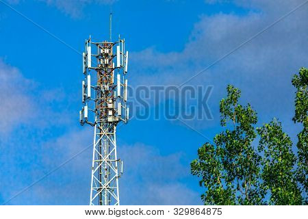 A Low Angle View Of A Cellular Tower Equipped With Gps, 3g, 4g And 5g Technologies Responsible For E