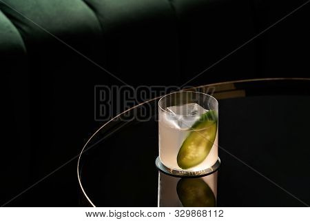Fresh Cocktail Glass On Glass Table In Night Club Restaurant