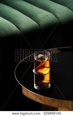 Fresh Cocktail Glass On Glass Table In Night Club Restaurant