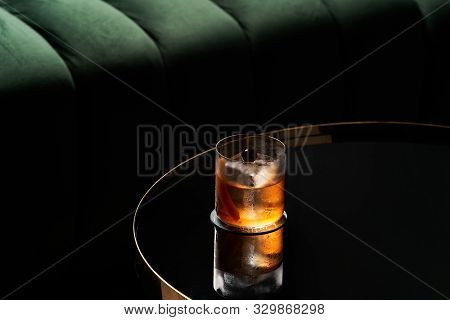 Fresh Cocktail Glass On Glass Table In Night Club Restaurant