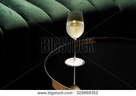 Fresh Cocktail Glass On Glass Table In Night Club Restaurant