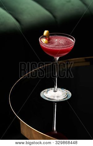 Fresh Cocktail Glass On Glass Table In Night Club Restaurant