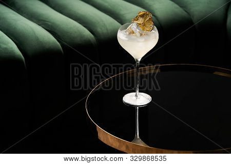 Fresh Cocktail Glass On Glass Table In Night Club Restaurant