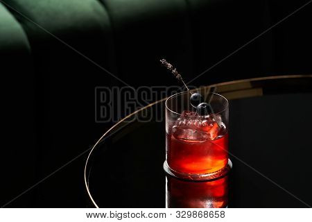 Fresh Cocktail Glass On Glass Table In Night Club Restaurant