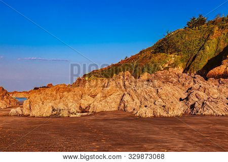 Wild Rocky Beach In Brittany On Armor Coastline.