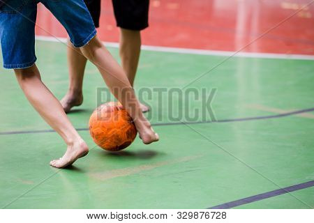 Futsal Players Barefoot. Futsal Player  Control And Shoot Ball To Goal. Soccer Players Fighting Each