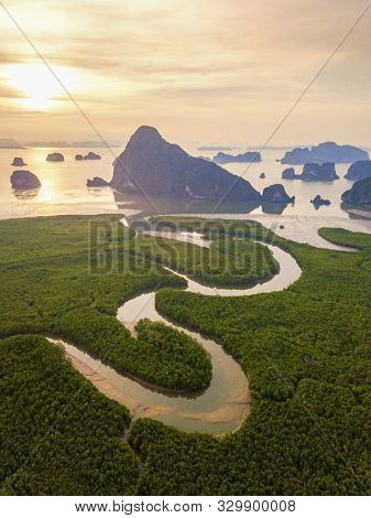 Aerial Top View Of Samet Nangshe, Mountain Valley Hills, And Tropical Green Forest Trees At Sunset W