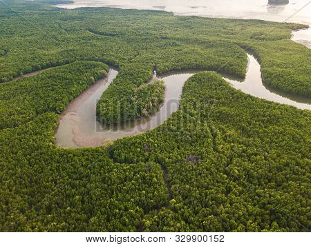 Aerial Top View Of Samet Nangshe, Mountain Valley Hills, And Tropical Green Forest Trees At Sunset W