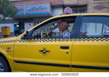 Tabriz, Iran - 11 August 2019 : Taxi, Taxi Driver And Taxi Passenger In Tabriz, Iran