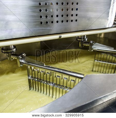 Equipment At Dairy Processing Plant At Work
