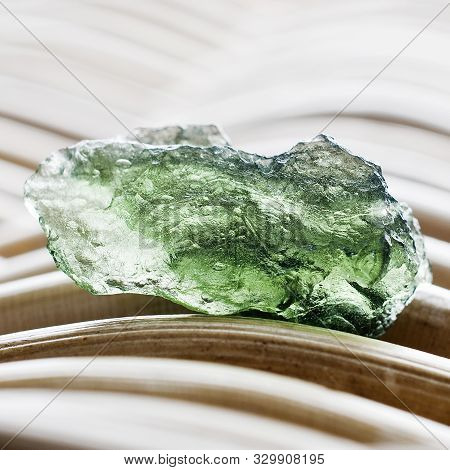Macro Photography Of A Moldavite Stone On A Wicker Background