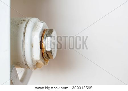 Rusty Plug Of A Central Heating Radiator.  Point Of Leakage.