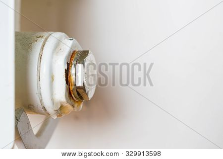 Rusty Plug Of A Central Heating Radiator.  Point Of Leakage.