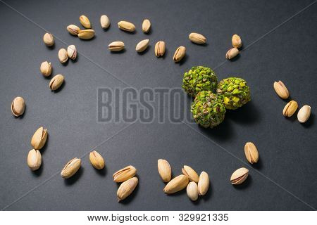 Turkish Pistachio Confectionery. Healthy Food. Scattered Pistachio Nuts. Top View. Copy Space.