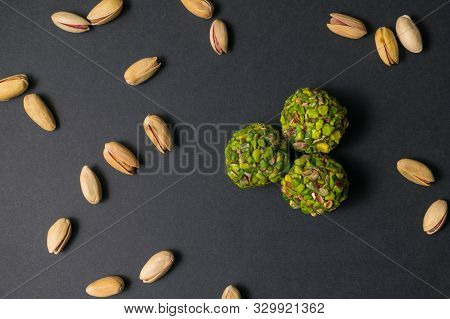 Fitness Snack. Flat Lay. Turkish Pistachio Candy. Healthy Snack. Scattered Pistachio Nuts. Top View.