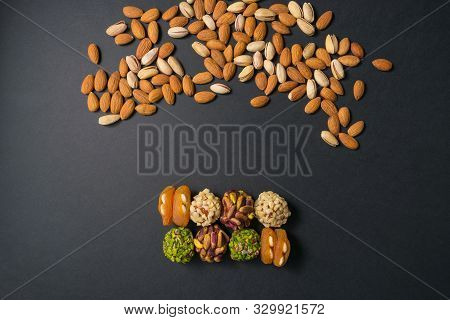 Healthy Snacks. Turkish No Sugar Food. Scattered Pistachio And Almond Nuts. Flat Lay. Middle East Pi