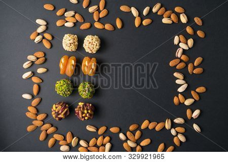 Healthy Snacks. Turkish No Sugar Food. Scattered Pistachio And Almond Nuts. Flat Lay. Middle East Pi