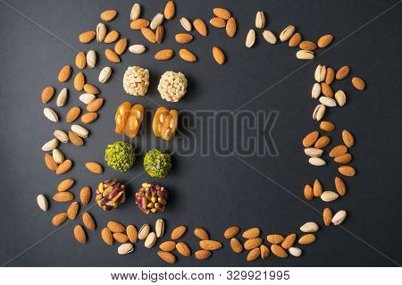 Moroccan Fruit And Nut Candy. Scattered Pistachio And Almond Nuts. Flat Lay. Middle East Pistachio C