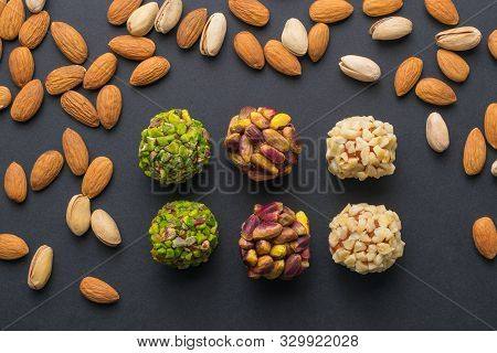 Middle East Pistachio Confectionery. Healthy No Sugar Food. Scattered Pistachio And Almond Nuts. Top