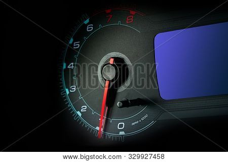 Tachometer And Car Speedometer Closeup. Car Dashboard. The Interior Of The Car.