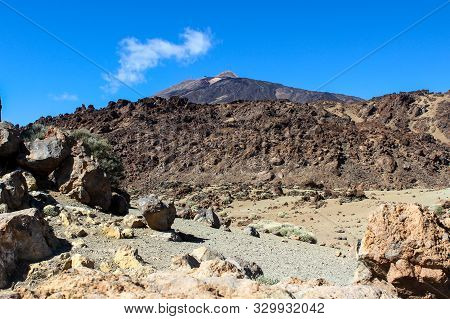 View on the steep coast of Los Gigantes on canary island tenerife with rocks in different colors
