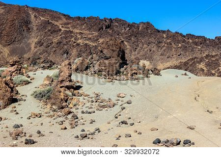 View on the steep coast of Los Gigantes on canary island tenerife with rocks in different colors