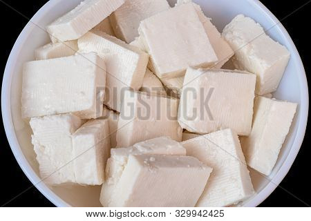 Paneer Cottage Cheese Close Up, Slice Pieces Of Homemade Fresh White Raw Panner Cheese.
