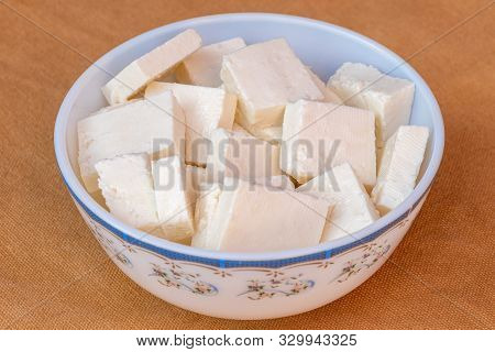 Paneer Cottage Cheese Close Up, Slice Pieces Of Homemade Fresh White Raw Panner Cheese.