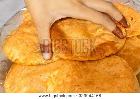 Indian Cuisine Puri Close Up, Delicious Deep Fried Poori (puri) Served.